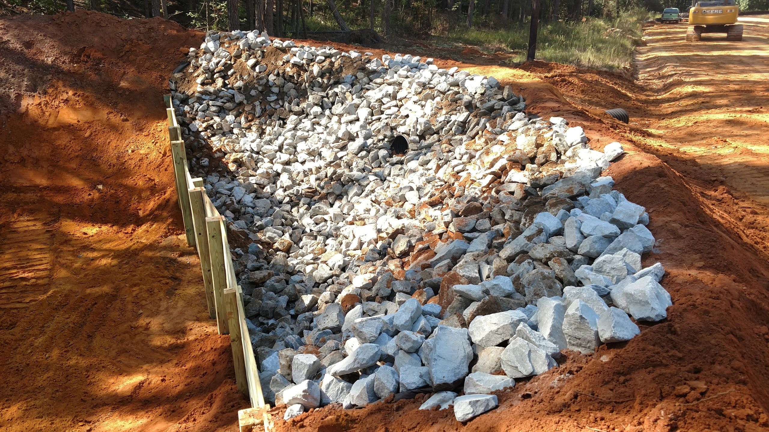 Excavator arm extended at construction site